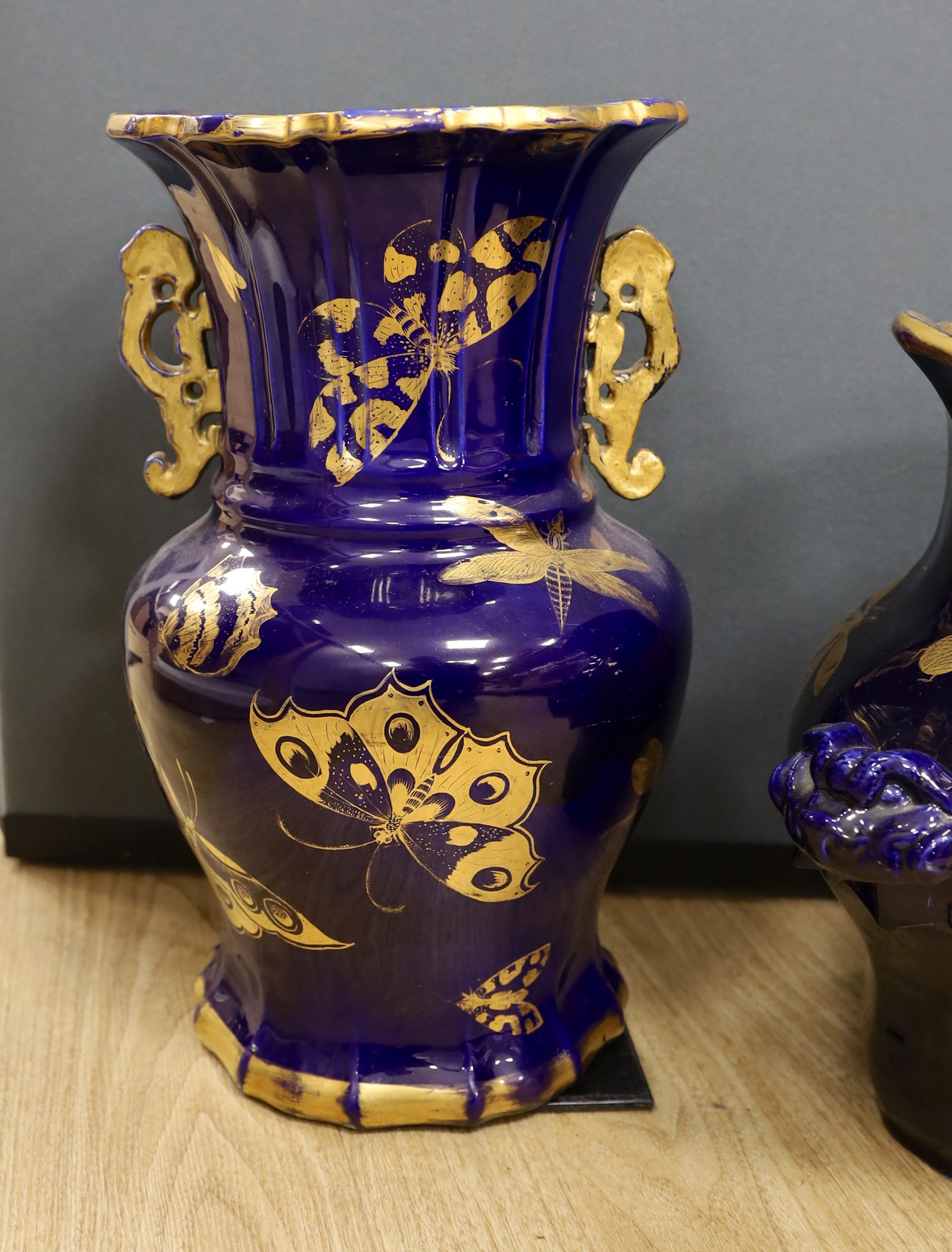 A large early 19th century Masons ironstone cobalt blue and gilt decorated jug and two similar large vases, tallest 37cms high